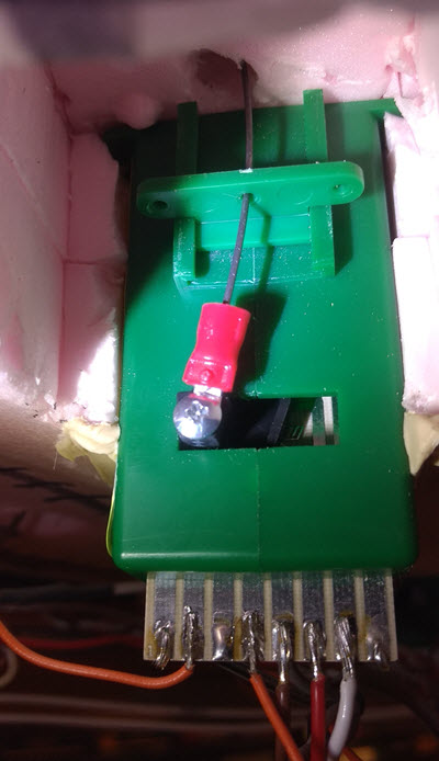 [wire loop secured]